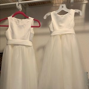 2 Flower Girl Dresses one size 4 and size 8 kids